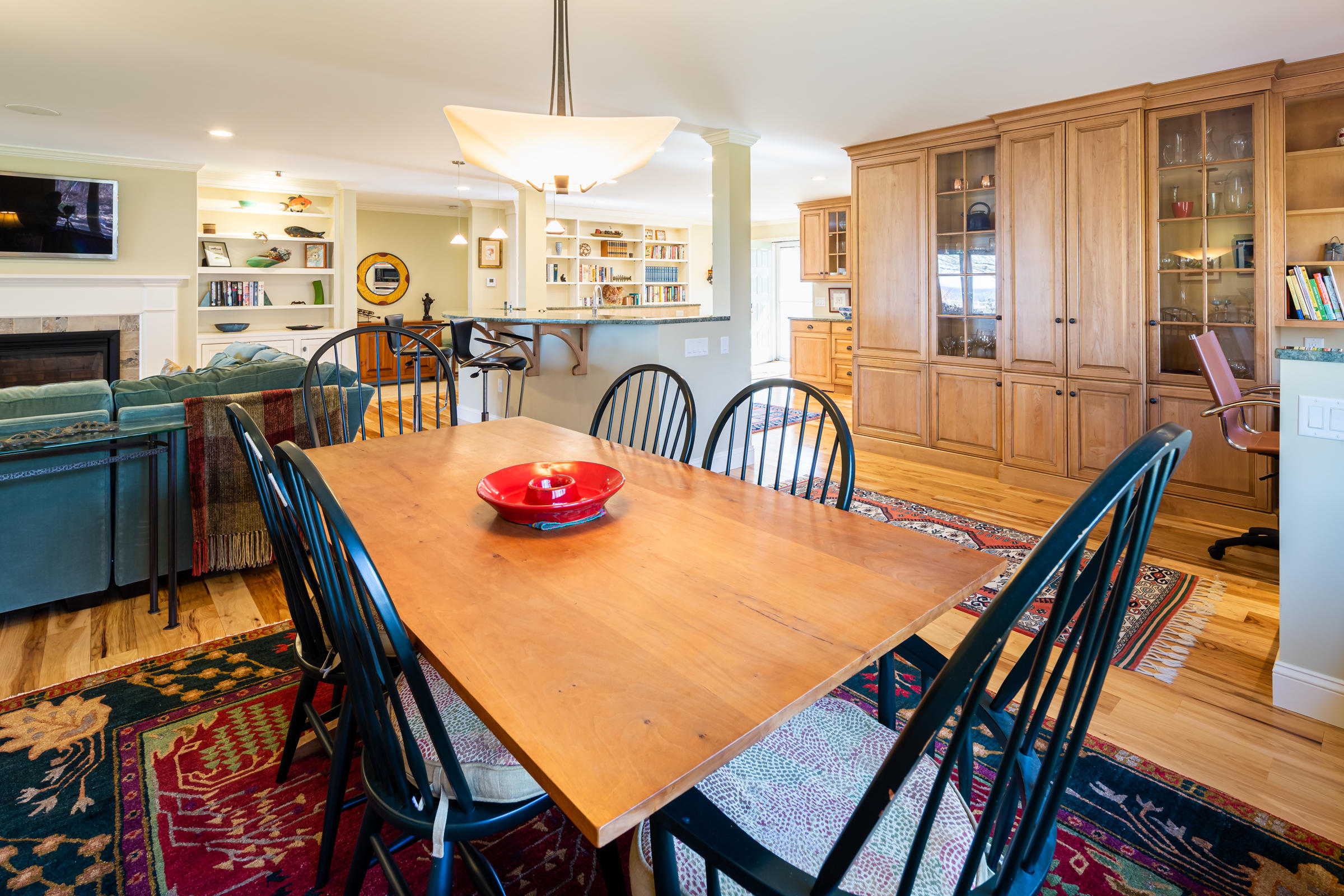 31 Wheeler Drive Brewster, MA 02631 - Photo 18 of 39 a dining room with furniture and a flat screen tv