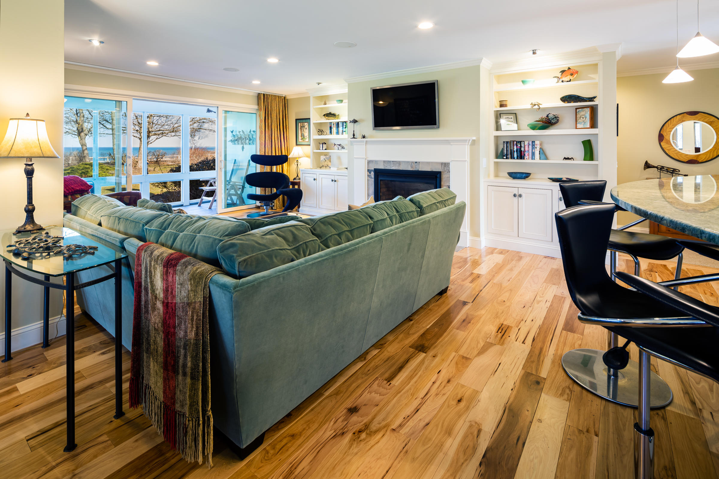 31 Wheeler Drive Brewster, MA 02631 - Photo 19 of 39 a living room with furniture and a flat screen tv