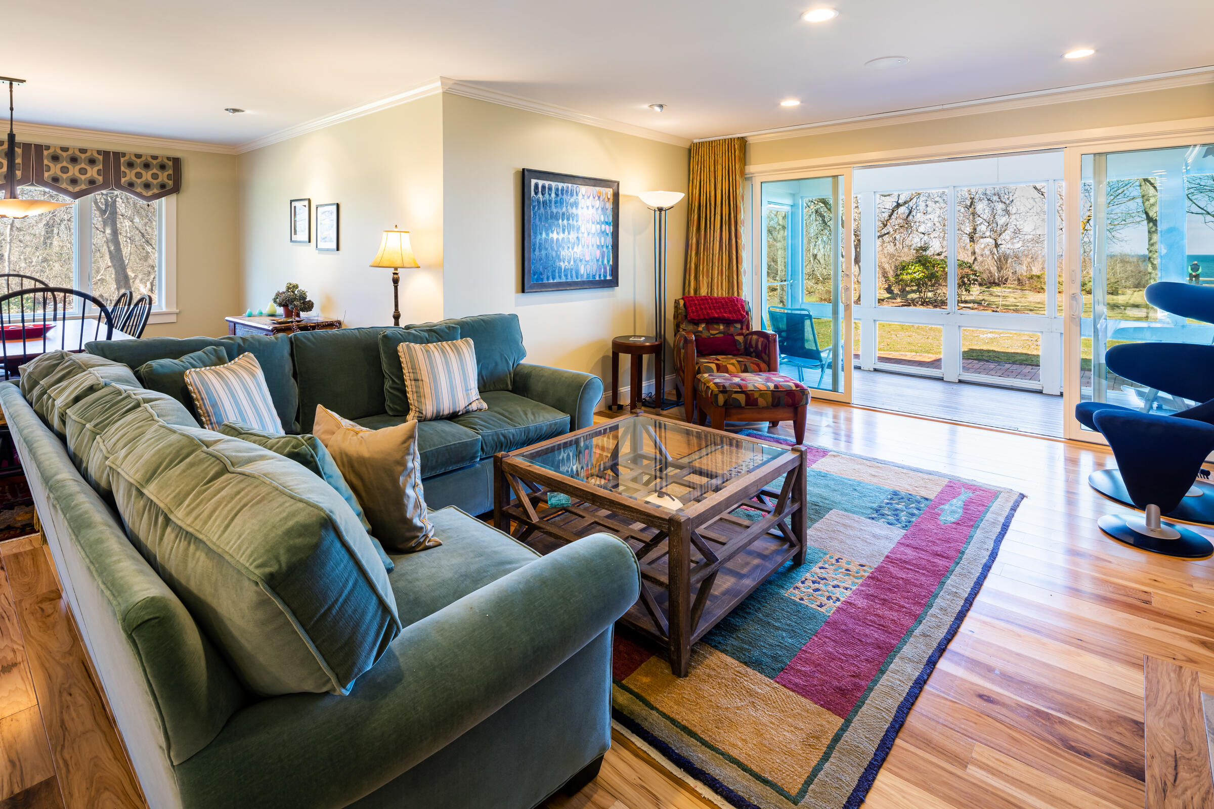 31 Wheeler Drive Brewster, MA 02631 - Photo 21 of 39 a living room with furniture a rug and a flat screen tv
