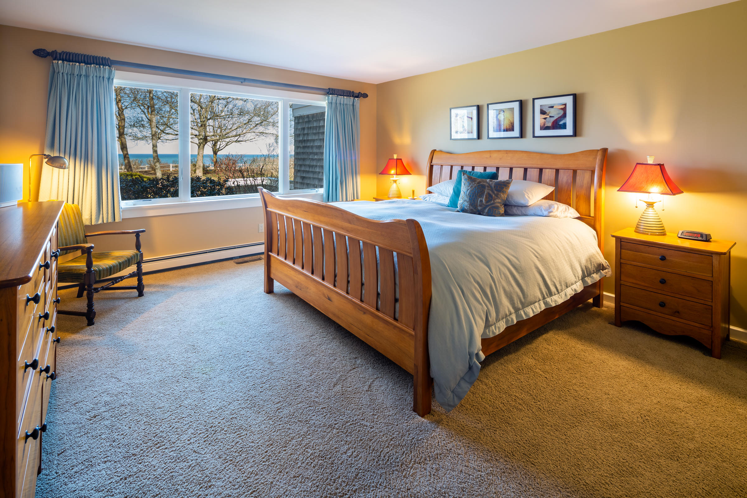 31 Wheeler Drive Brewster, MA 02631 - Photo 24 of 39 a spacious bedroom with a bed and a large window