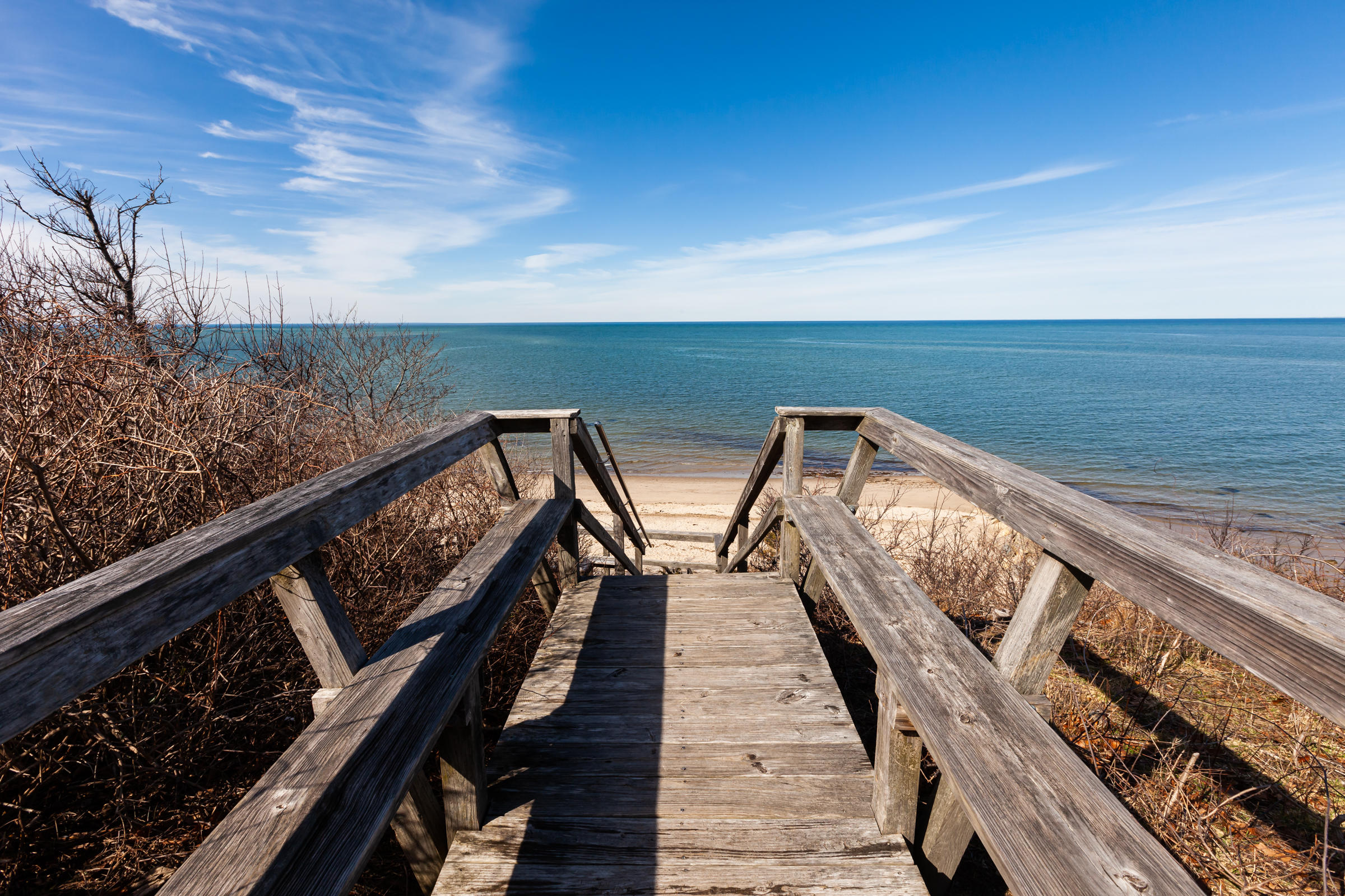 31 Wheeler Drive Brewster, MA 02631 - Photo 8 of 39 a view of wooden floor with two chairs