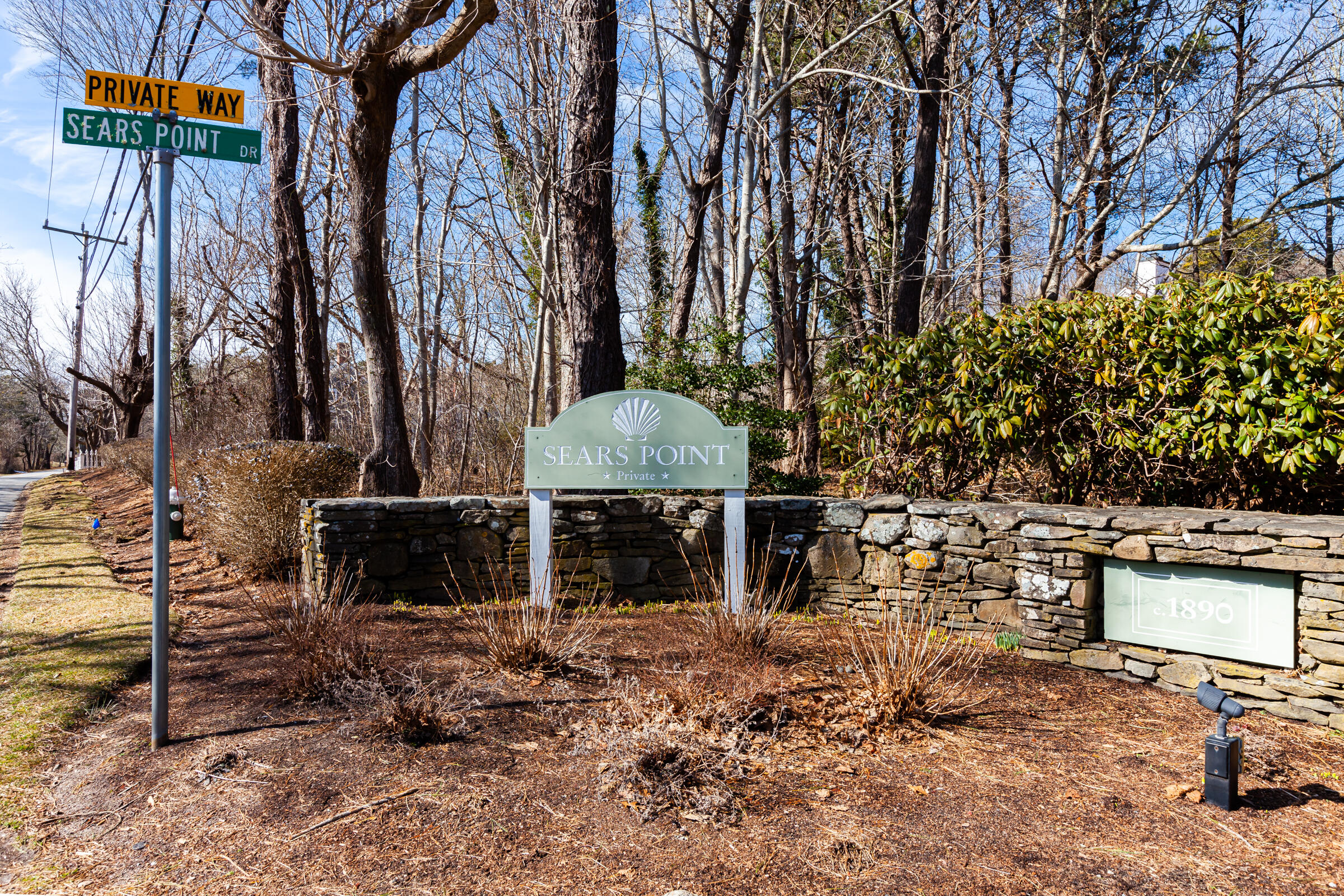 31 Wheeler Drive Brewster, MA 02631 - Photo 10 of 39 a backyard of a house with table and chairs