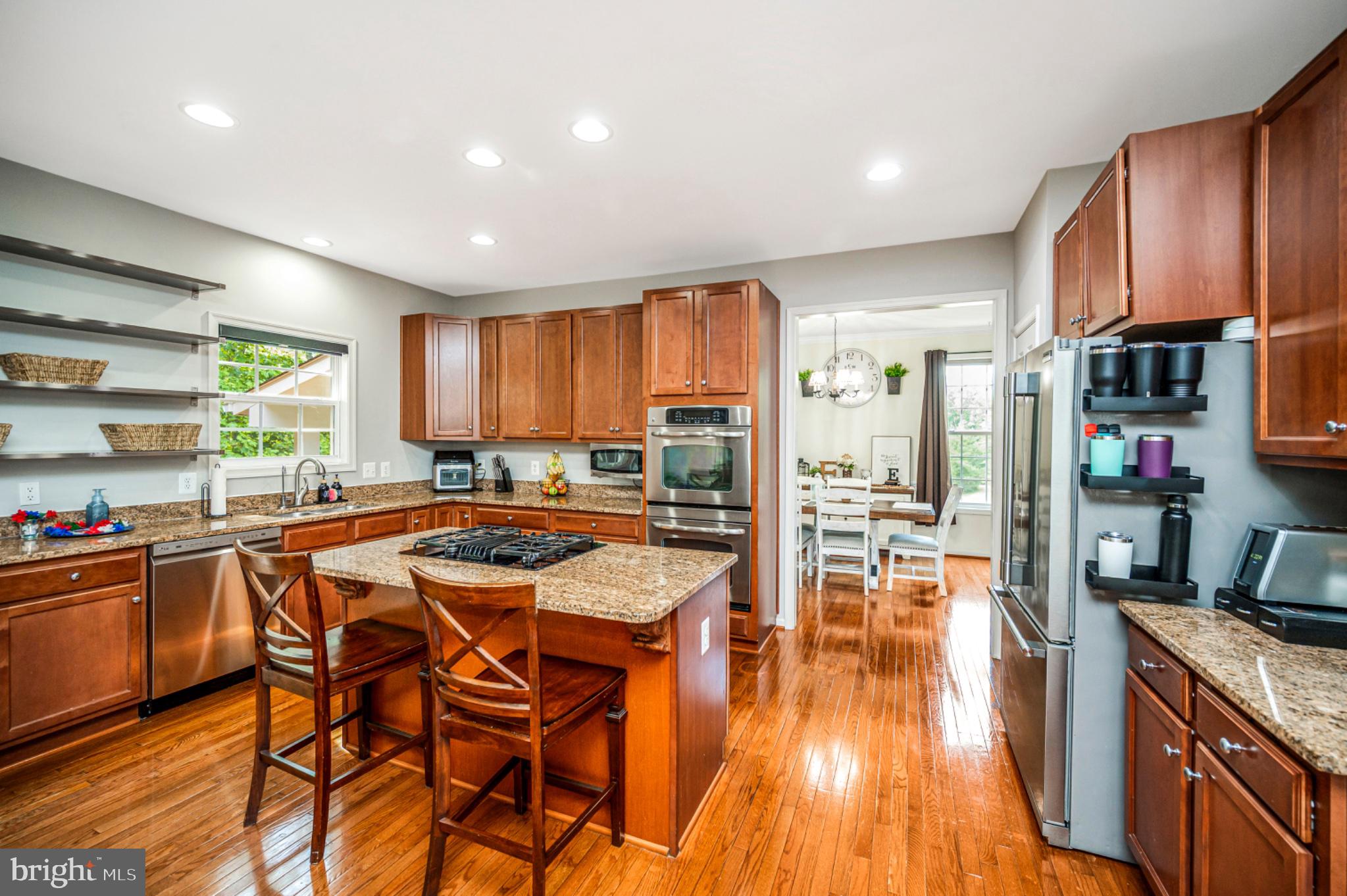 239 Toluca Road Stafford, VA 22556 - Photo 39 of 75 Modern kitchen with warm wood tones.