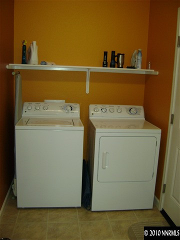 1924 A Wind Ranch Road Reno, NV 89521 - Photo 6 of 9 a utility room with dryer and washer