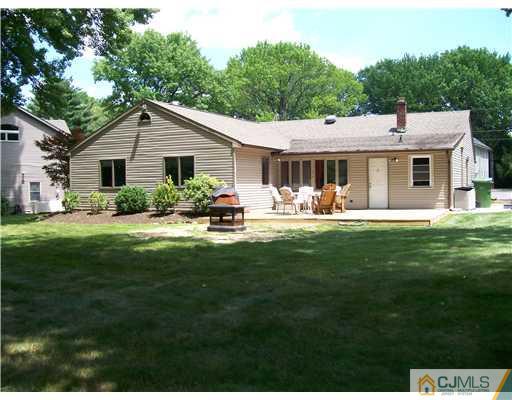 21 Maida Road Edison, NJ 08820 - Photo 2 of 10 a front view of house with yard and green space