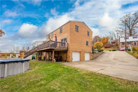 a view of a house with a swimming pool