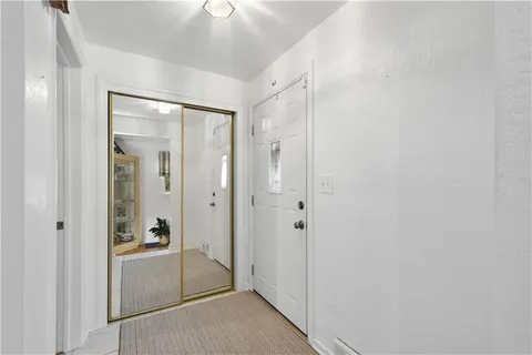 a bathroom with a shower and a sink