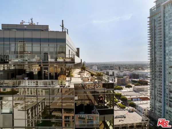 a view of a city with tall buildings