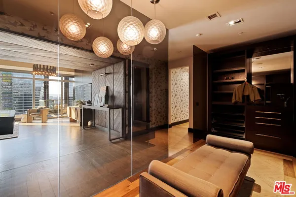 a room with furniture and a flat screen tv