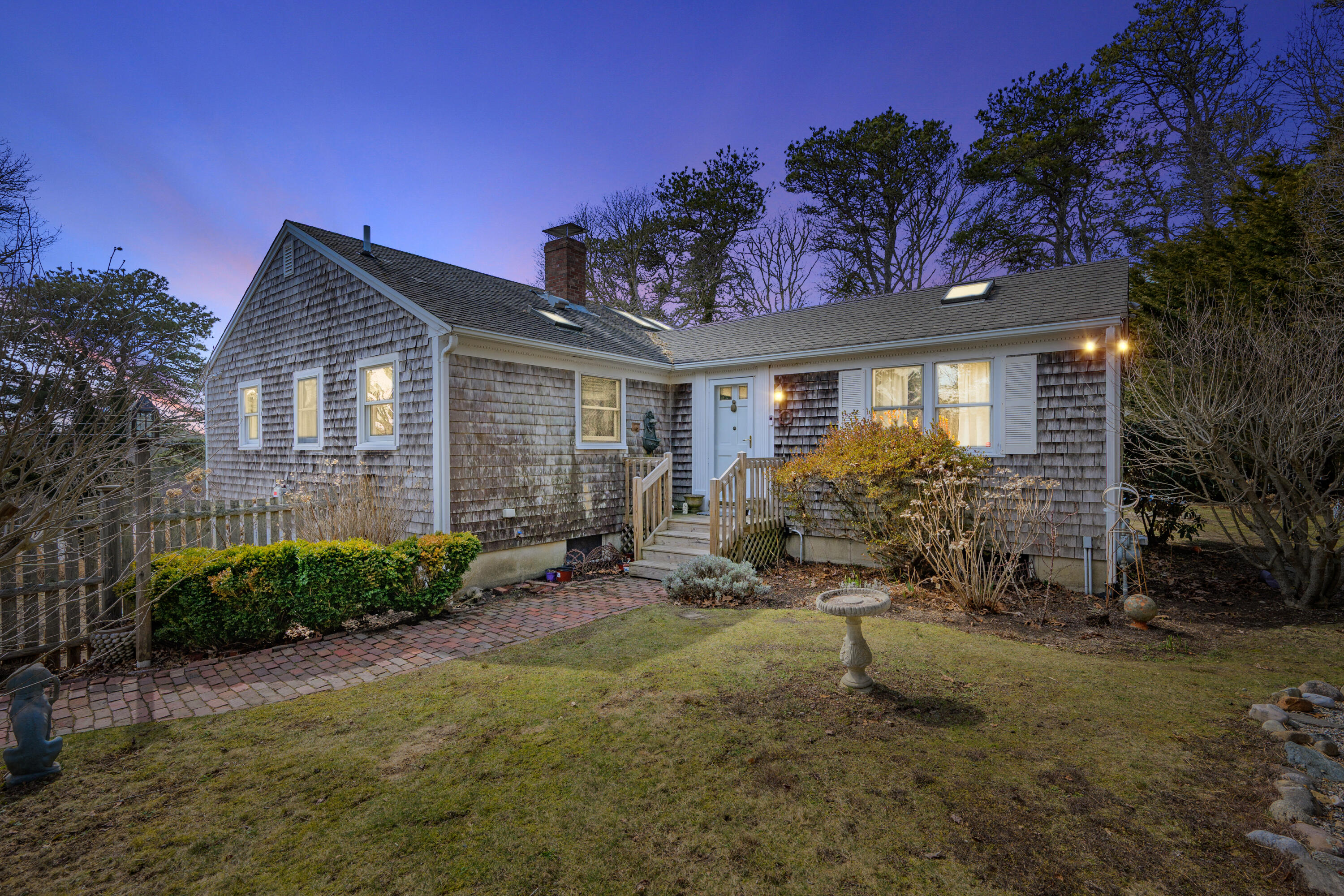 118 Wilfred Road Chatham, MA 02633 - Photo 3 of 49 a view of a house with a small yard and potted plants