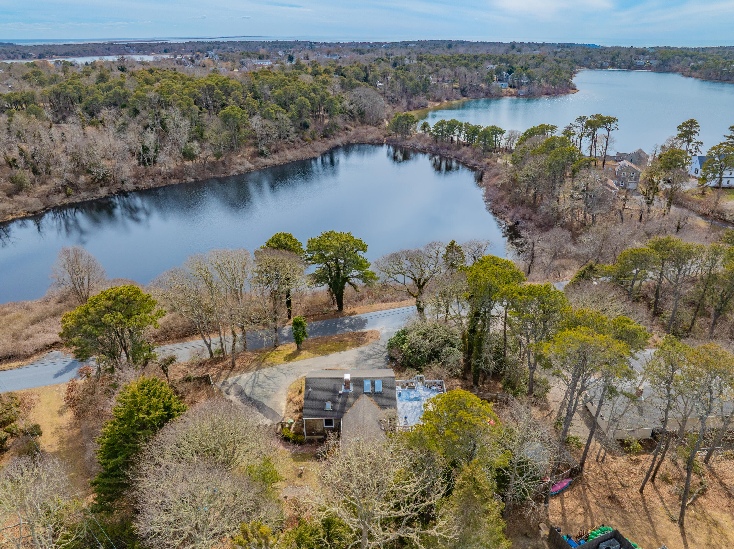 118 Wilfred Road Chatham, MA 02633 - Photo 5 of 49 a view of a lake with a mountain in the back