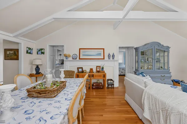 a living room with furniture and a table