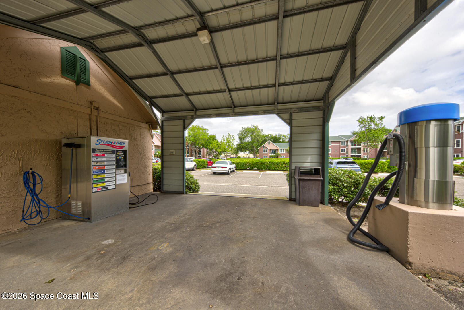 7667 North Wickham Road, Unit 1416 Melbourne, FL 32940 - Photo 40 of 41 a view of a chairs and table in the patio