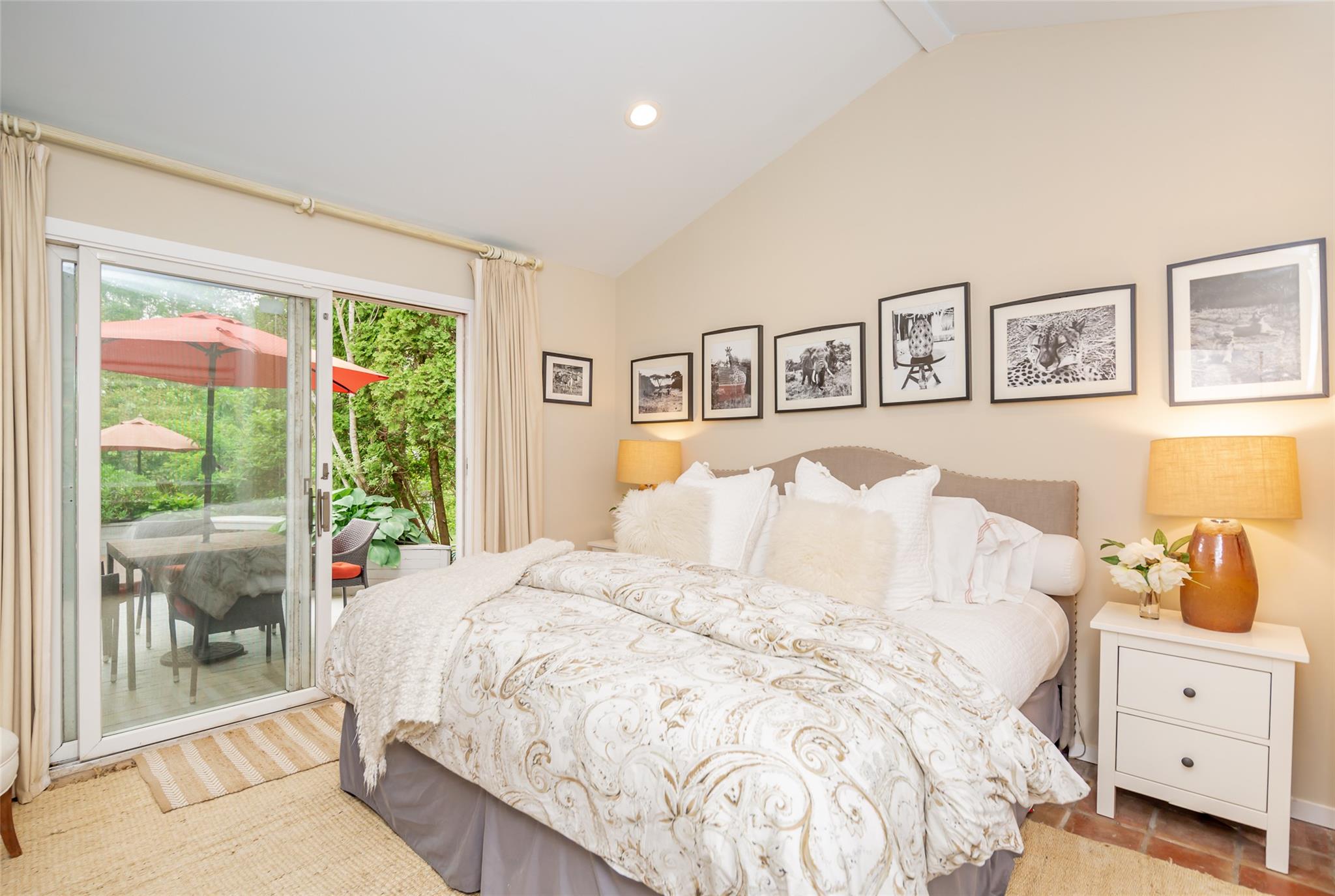 21 Hillover Road East Hampton Bays, NY 11946 - Photo 19 of 33 a bed room with a bed and a large window