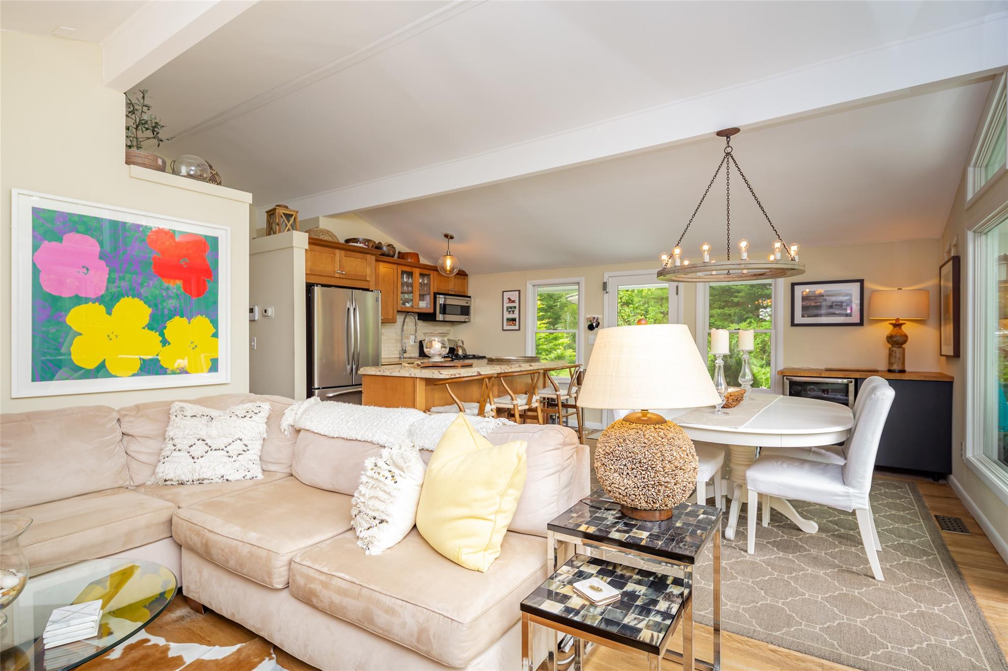 21 Hillover Road East Hampton Bays, NY 11946 - Photo 32 of 33 a living room with furniture a rug and a table