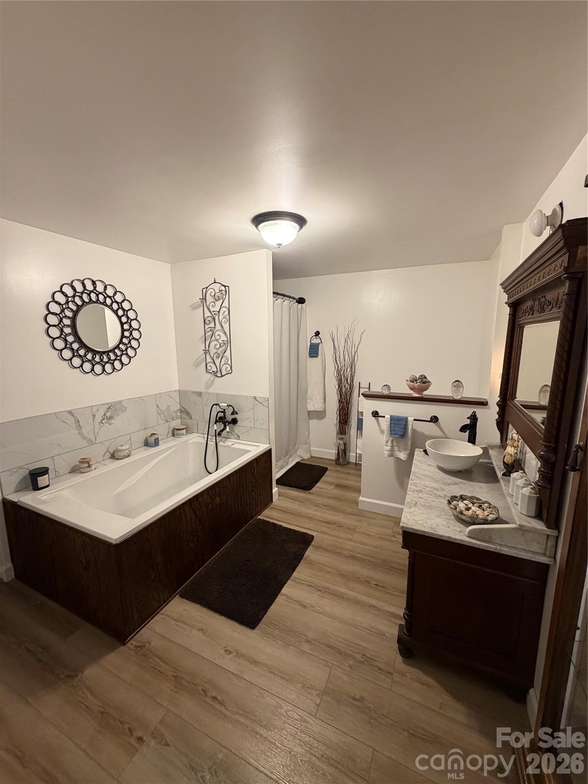 658 Upper Hanging Rock Road Spruce Pine, NC 28777 - Photo 15 of 35 a living room with furniture and a table