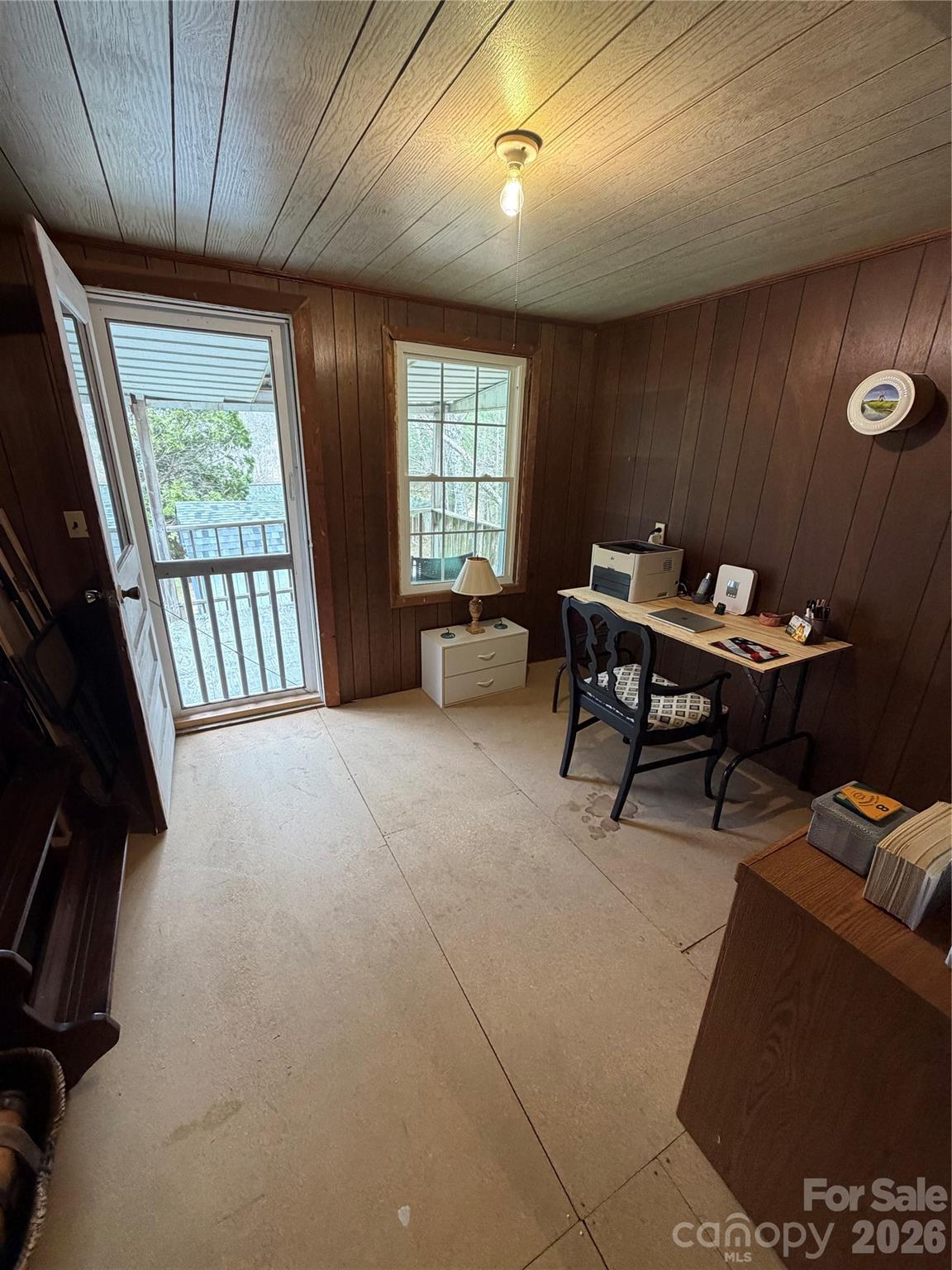 658 Upper Hanging Rock Road Spruce Pine, NC 28777 - Photo 21 of 35 a view of a livingroom with furniture and a window