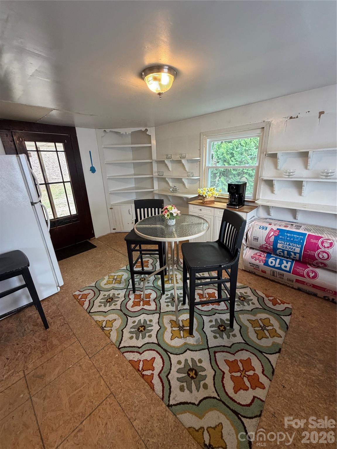 658 Upper Hanging Rock Road Spruce Pine, NC 28777 - Photo 27 of 35 a view of a livingroom with furniture and window