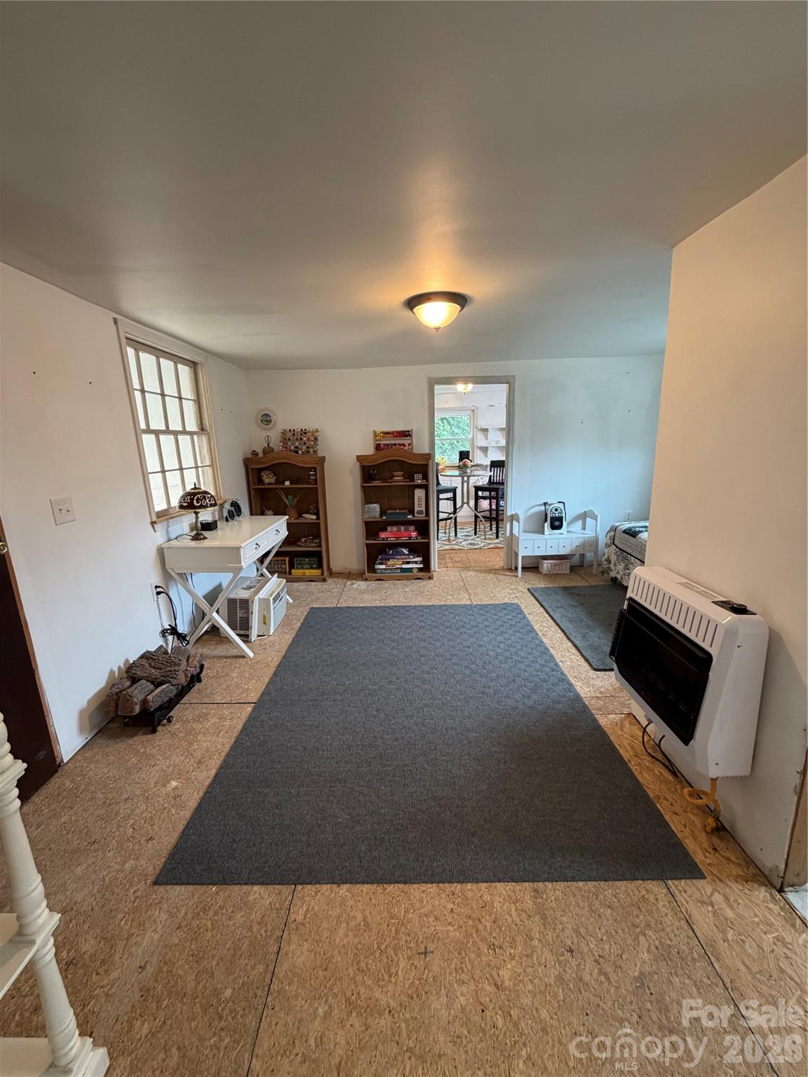 658 Upper Hanging Rock Road Spruce Pine, NC 28777 - Photo 31 of 35 a view of a room with gym equipment