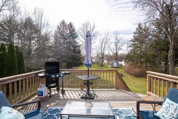 a view of house with outdoor seating space