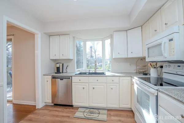 a bathroom with a sink toilet and a shower