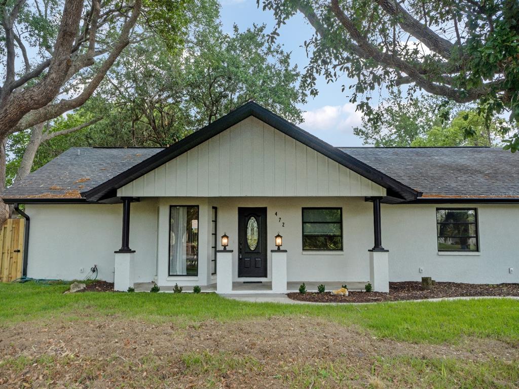 472 Colgate Road Venice, FL 34293 - Photo 1 of 1 a front view of a house with a yard