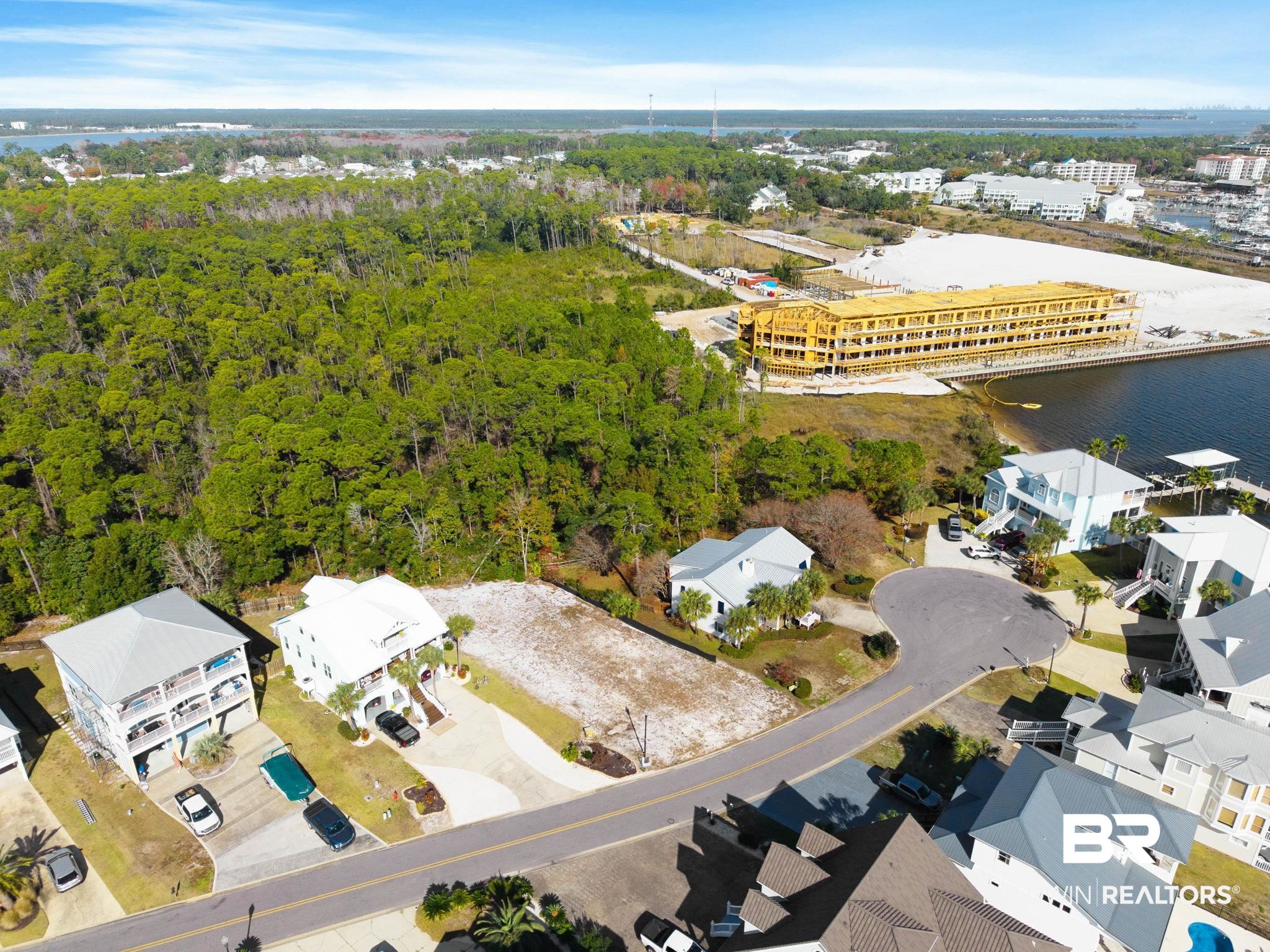 4143 Harbor Road Orange Beach, AL 36561 - Photo 5 of 33 Drone / aerial view of a large body of water