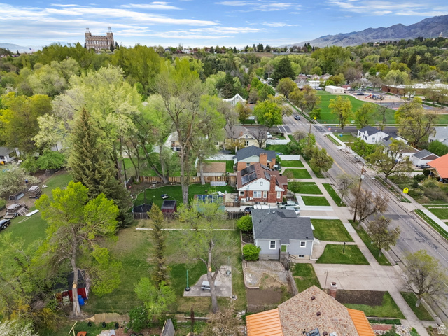 141 South 400 East Logan, UT 84321 - Photo 38 of 41 Aerial perspective of suburban area with a mountain backdrop