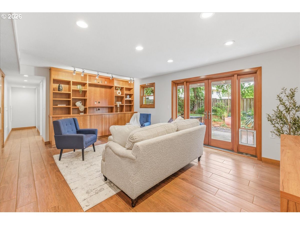3130 Southwest 116th Avenue Beaverton, OR 97005 - Photo 25 of 44 a living room with furniture and a large window