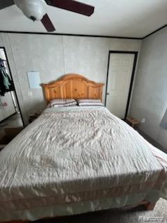 121 Haskin Street Boon, MI 49618 - Photo 8 of 13 Bedroom with a closet and a ceiling fan