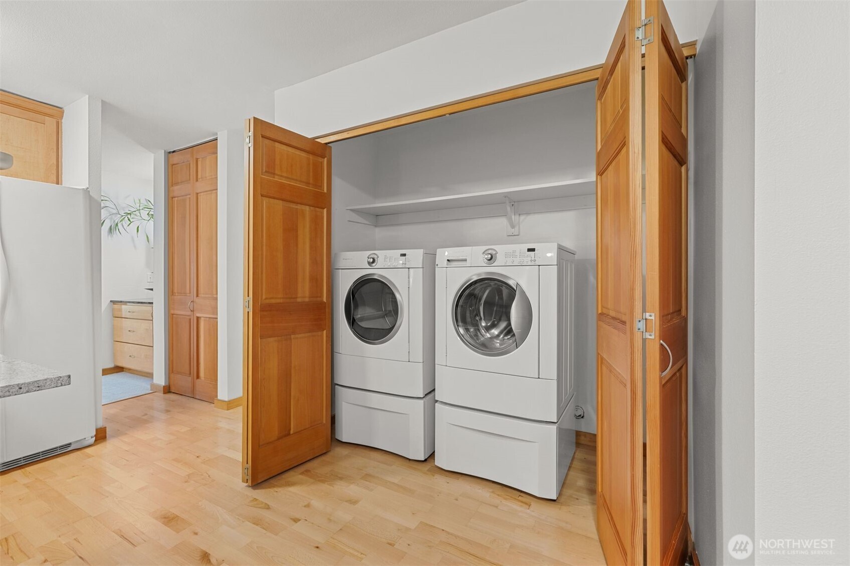 6423 Sand Point Way Northeast Seattle, WA 98115 - Photo 19 of 40 a utility room with dryer and washer