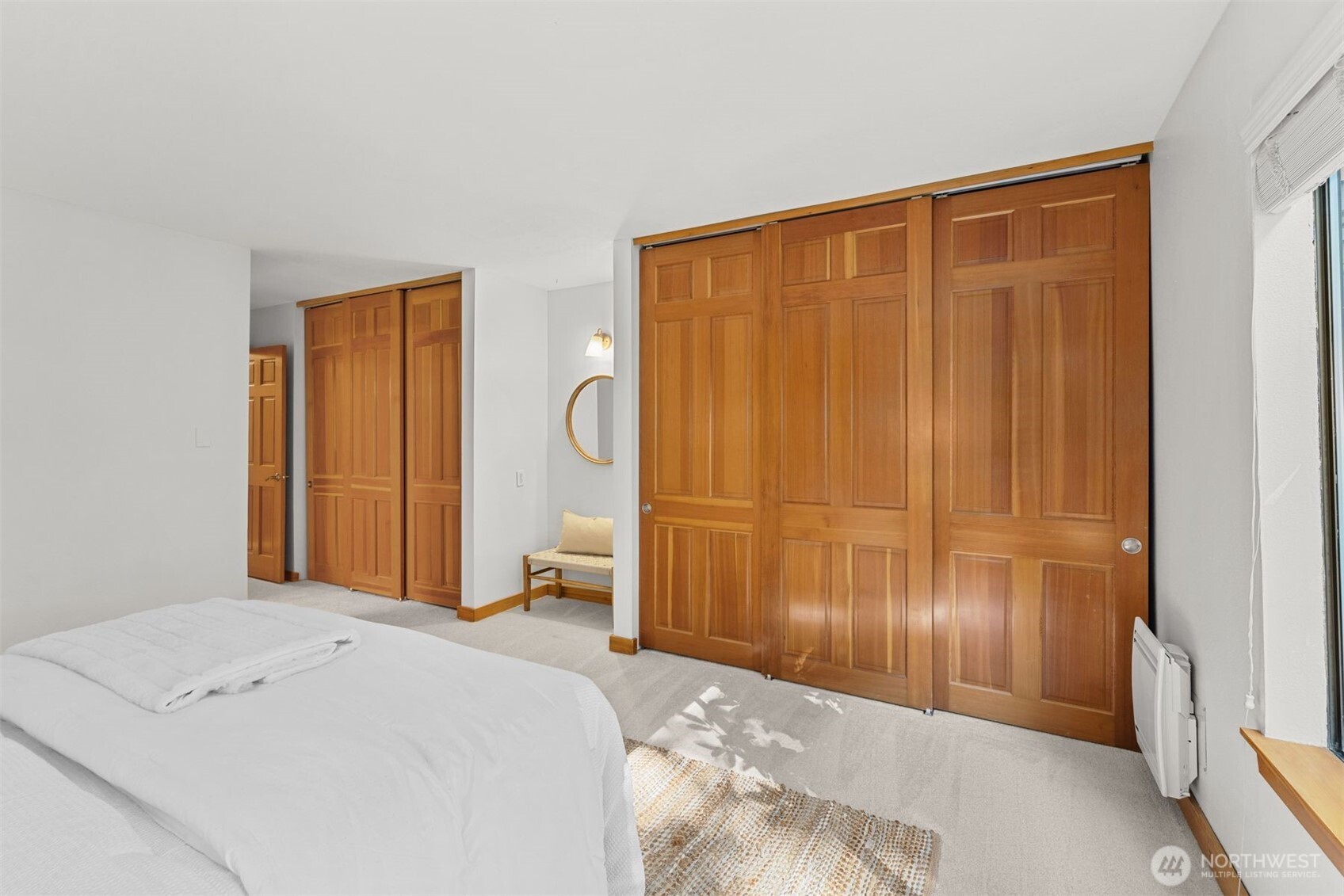 6423 Sand Point Way Northeast Seattle, WA 98115 - Photo 21 of 40 a bedroom with a bed and a dresser