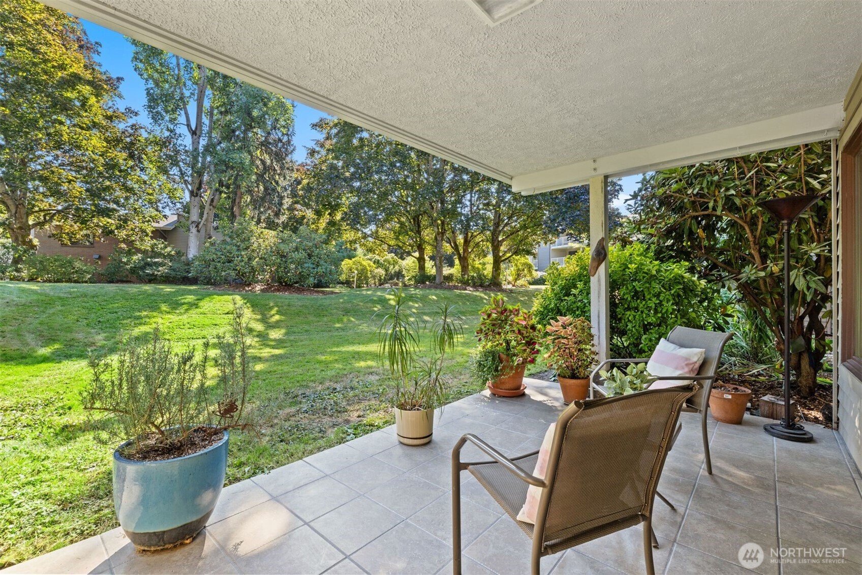 6423 Sand Point Way Northeast Seattle, WA 98115 - Photo 26 of 40 a view of a patio with furniture