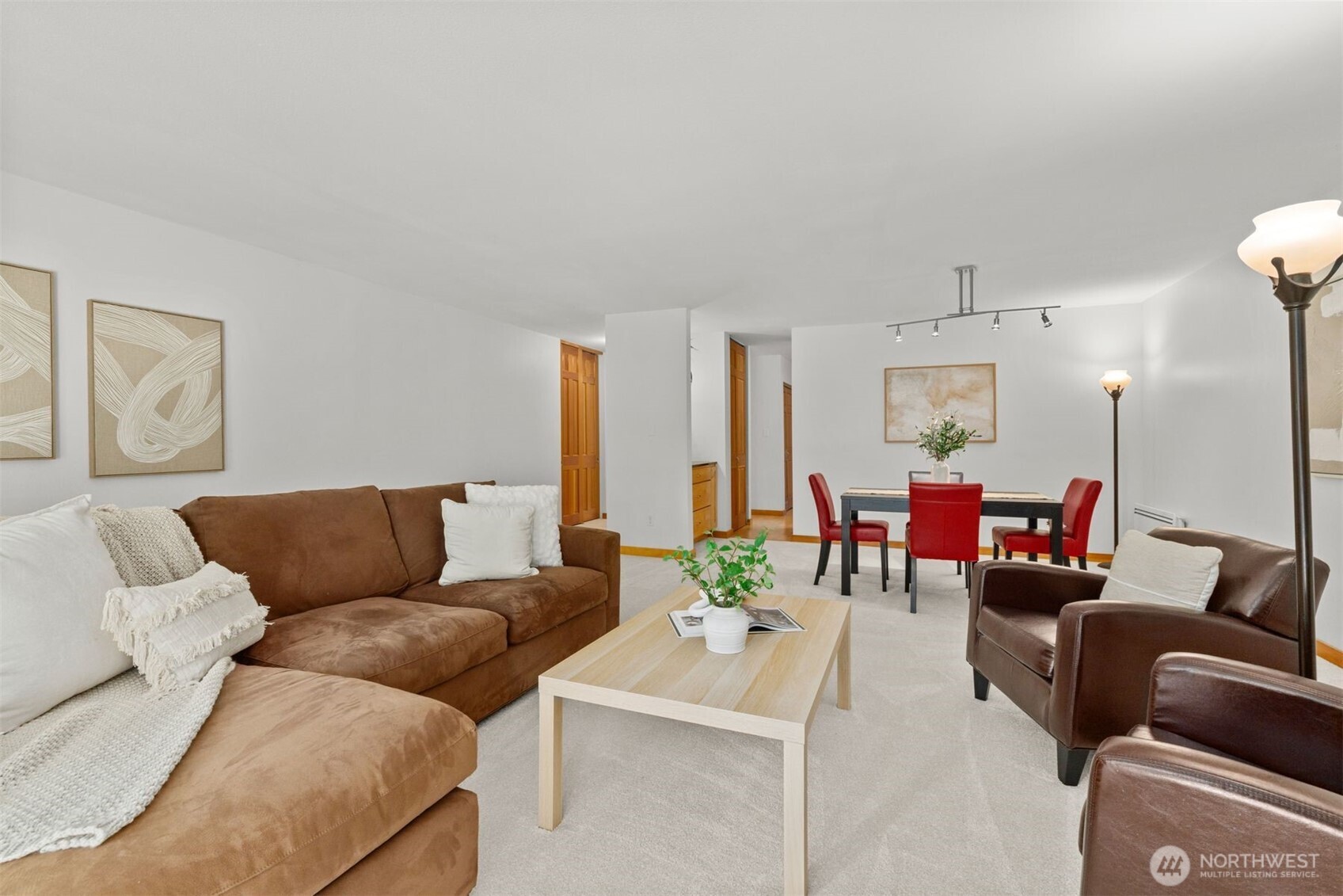 6423 Sand Point Way Northeast Seattle, WA 98115 - Photo 9 of 40 a living room with furniture and a large window