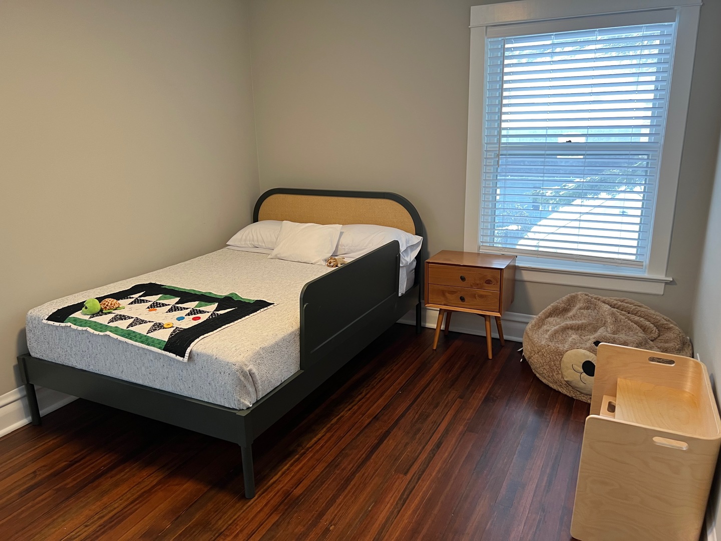 1100 Ridge Road Wilmette, IL 60091 - Photo 14 of 20 a bedroom with a bed and wooden floor