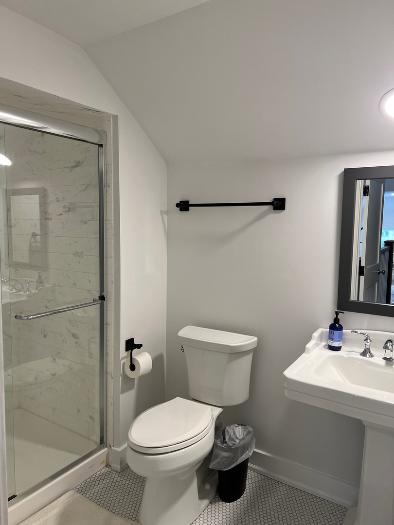 1100 Ridge Road Wilmette, IL 60091 - Photo 18 of 20 a bathroom with a toilet sink and shower