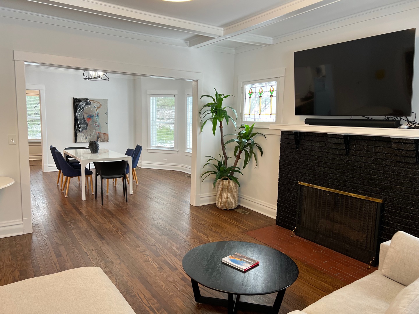 1100 Ridge Road Wilmette, IL 60091 - Photo 3 of 20 a living room with furniture and a flat screen tv