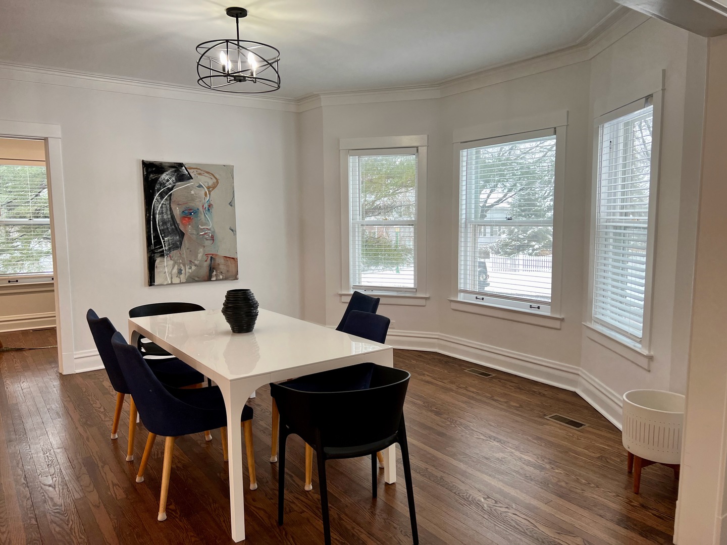 1100 Ridge Road Wilmette, IL 60091 - Photo 4 of 20 a view of a dining room with furniture window and wooden floor