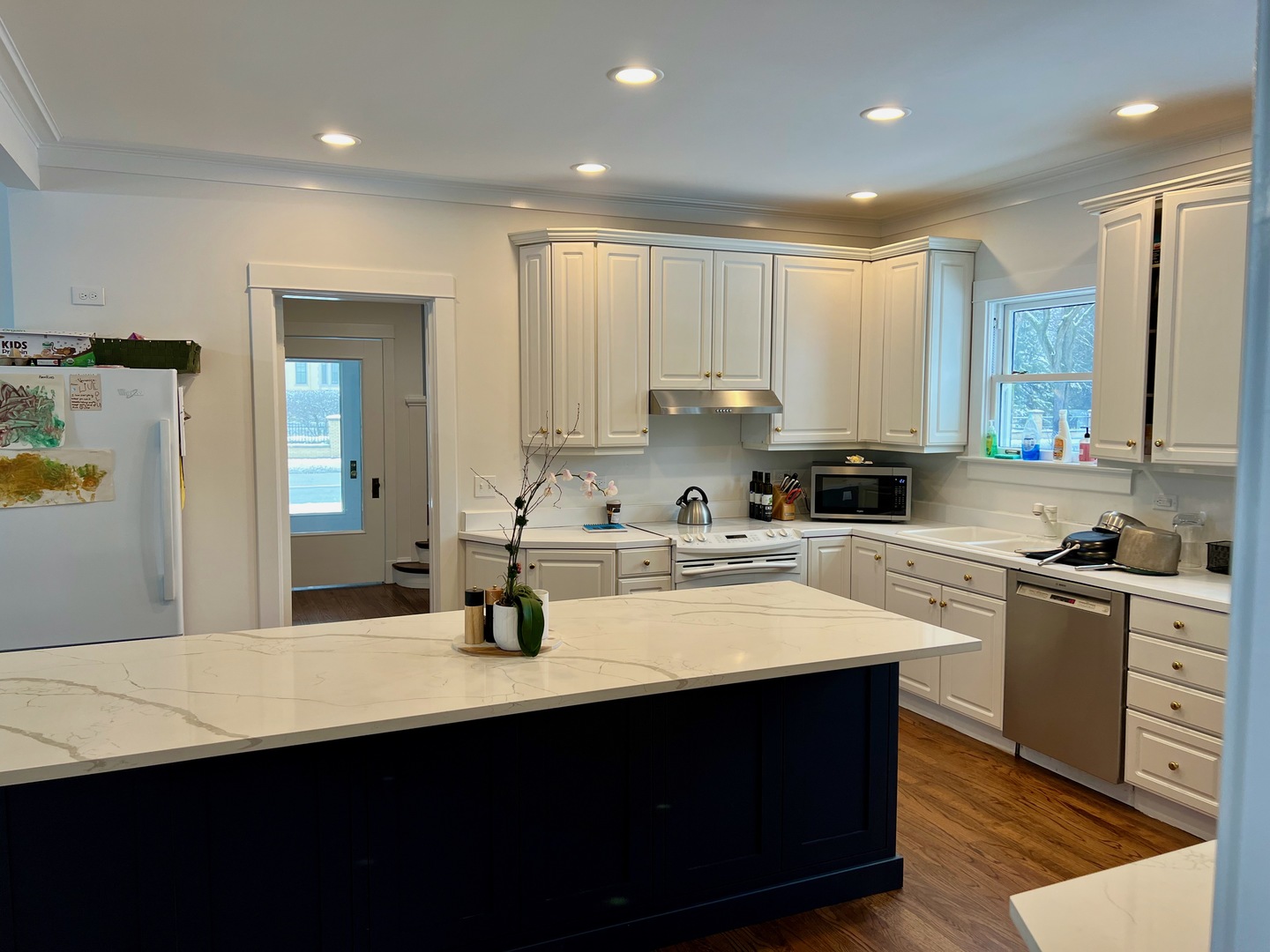 1100 Ridge Road Wilmette, IL 60091 - Photo 7 of 20 a kitchen with a sink cabinets and window