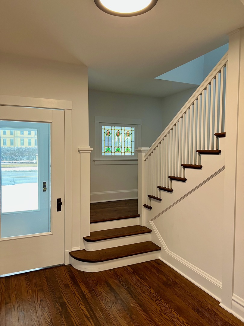 1100 Ridge Road Wilmette, IL 60091 - Photo 9 of 20 a view of entryway and hall with wooden floor