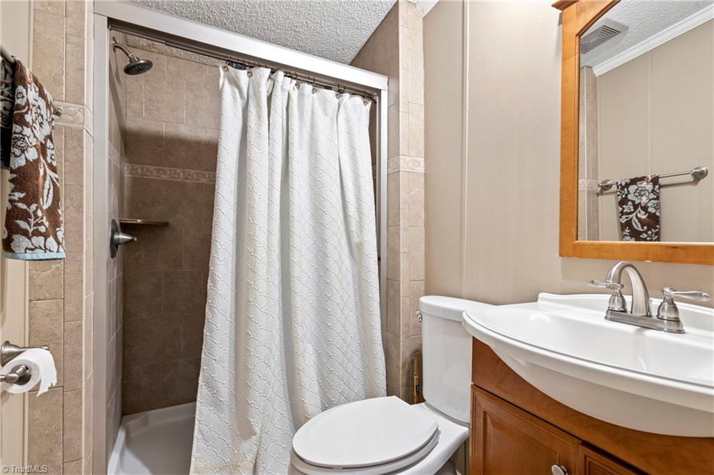 211 Yount Road Eden, NC 27288 - Photo 30 of 33 2nd bathroom