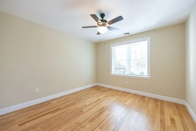 a view of a house with backyard porch and sitting area