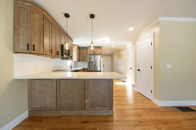 a view of a dining room with furniture