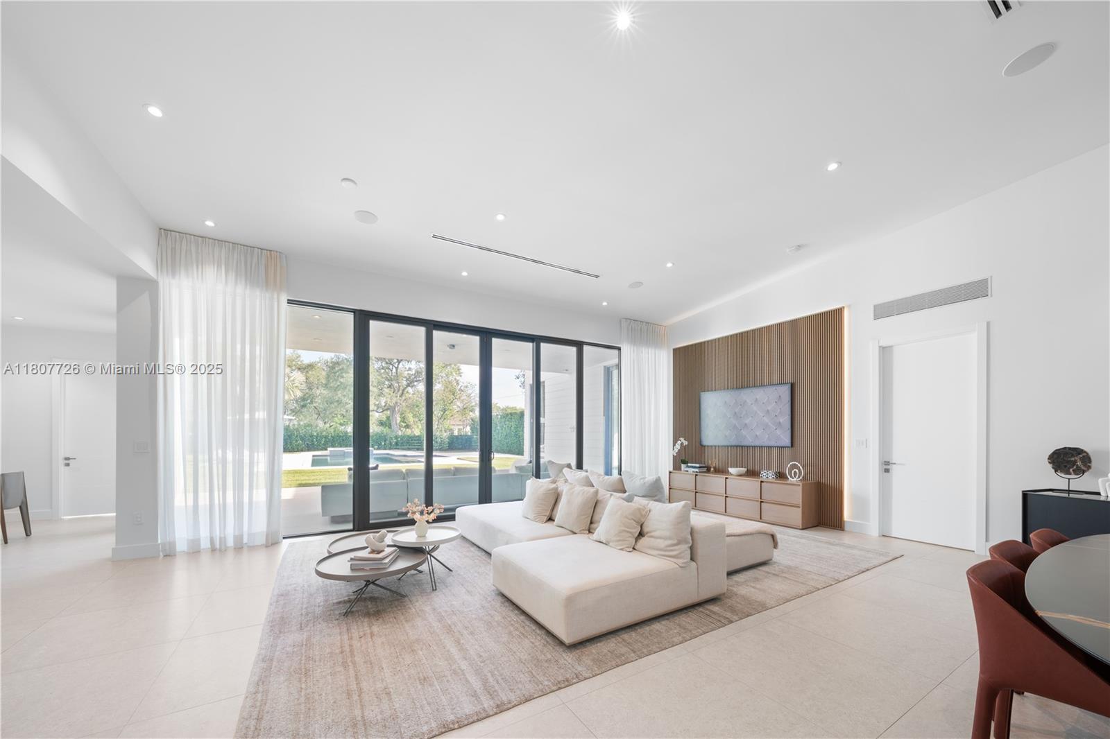 9450 Southwest 98th Street Miami, FL 33176 - Photo 15 of 66 a bedroom with furniture and large windows