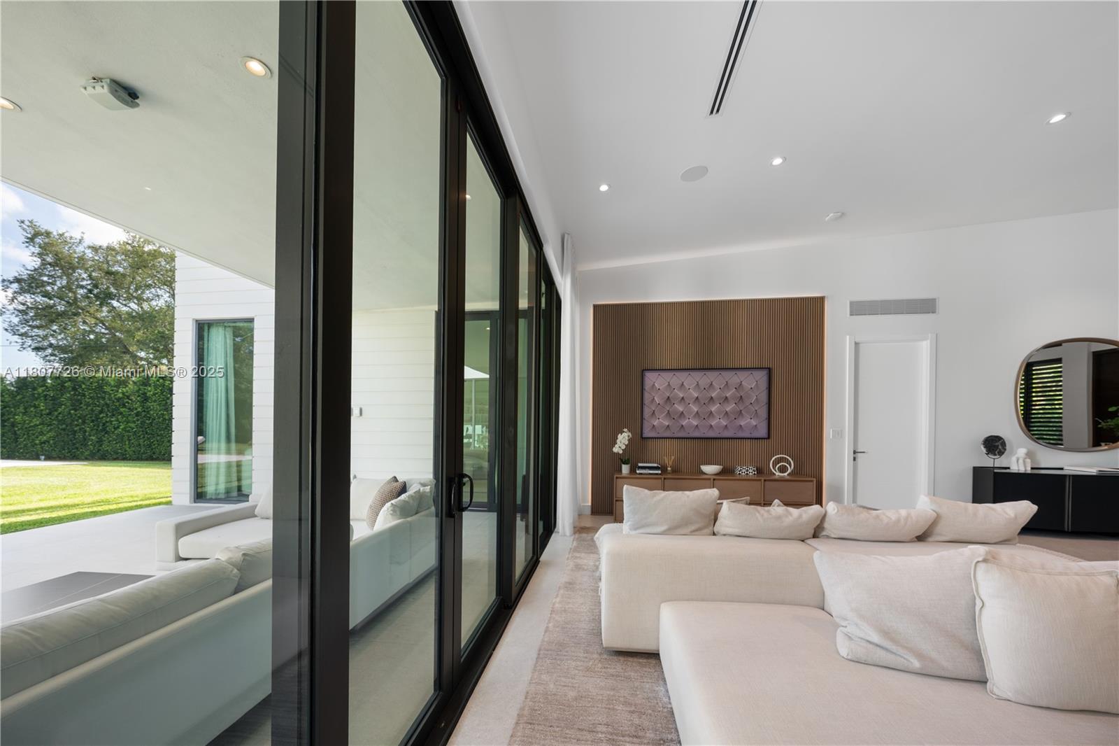 9450 Southwest 98th Street Miami, FL 33176 - Photo 16 of 66 a living room with furniture and a large window