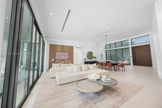 a living room with furniture and a couch