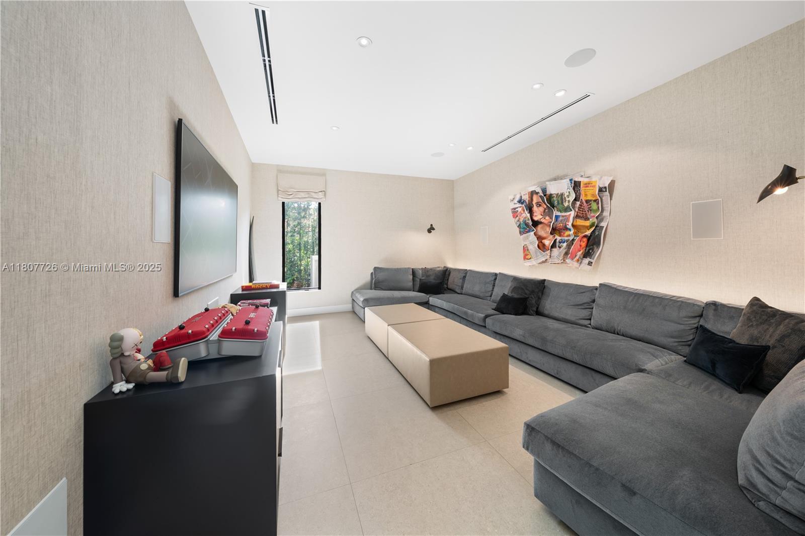 9450 Southwest 98th Street Miami, FL 33176 - Photo 21 of 66 a living room with furniture and painting on the wall