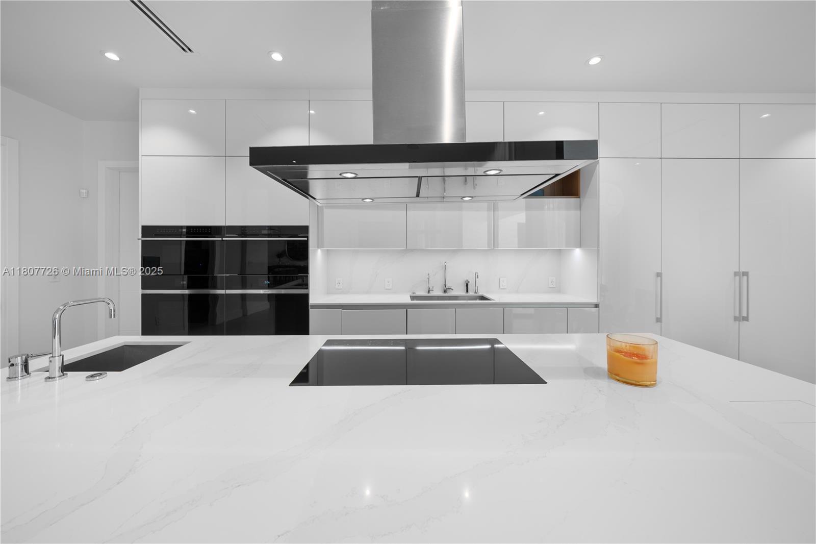 9450 Southwest 98th Street Miami, FL 33176 - Photo 27 of 66 a kitchen with stainless steel appliances a refrigerator and a sink