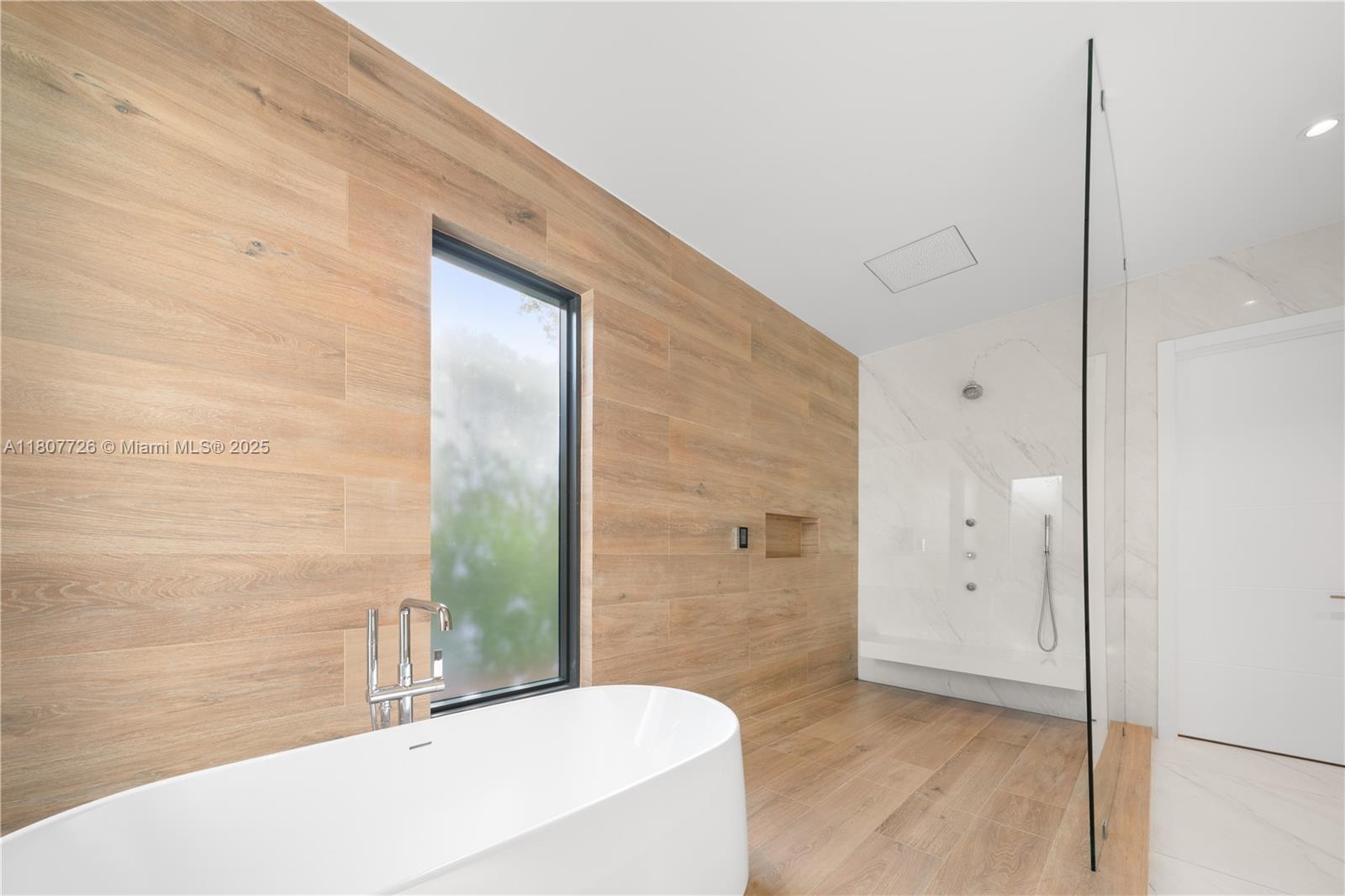 9450 Southwest 98th Street Miami, FL 33176 - Photo 40 of 66 a bathroom with a bathtub and a shower