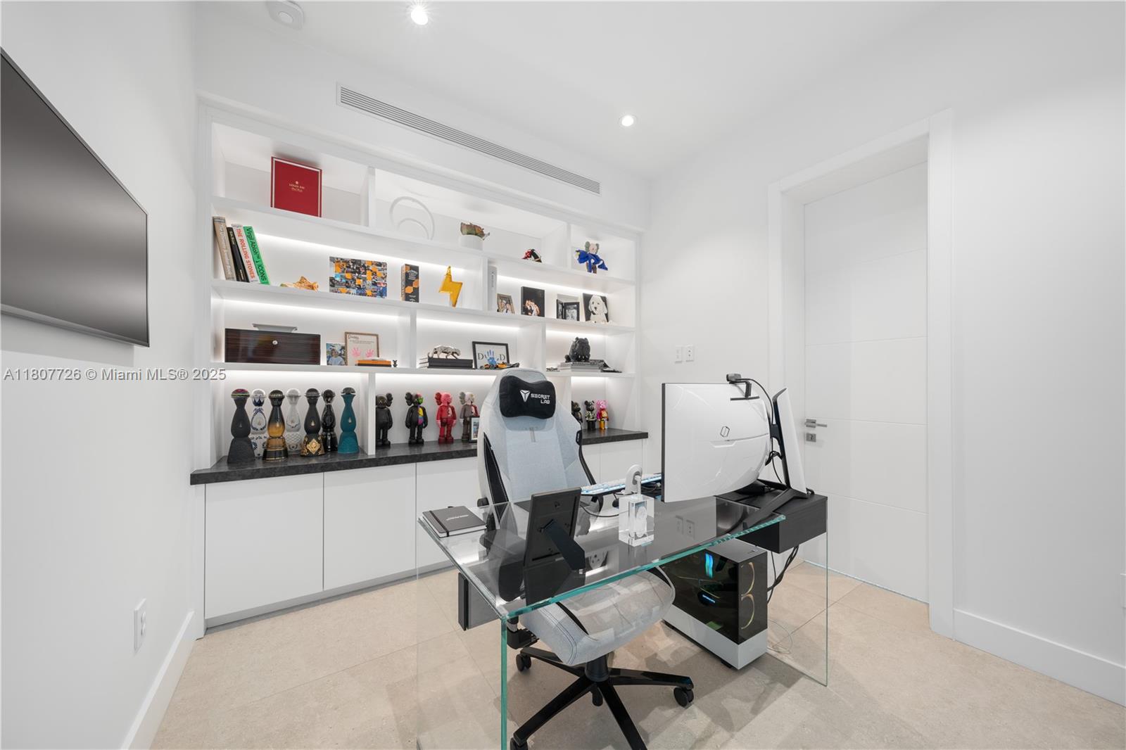 9450 Southwest 98th Street Miami, FL 33176 - Photo 46 of 66 a living room with furniture and a flat screen tv